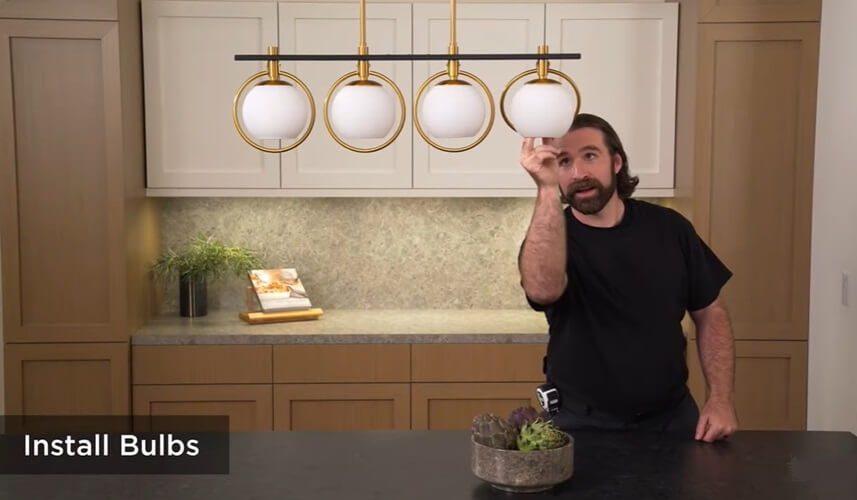 Encinitas Kitchen Lighting Installation Service. The worker are installing bulbs lights in the kitchen